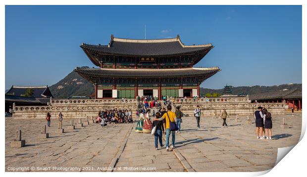 Tourists at the entrance to Gyeongbokgung Palace on a fall day in Seoul Print by SnapT Photography