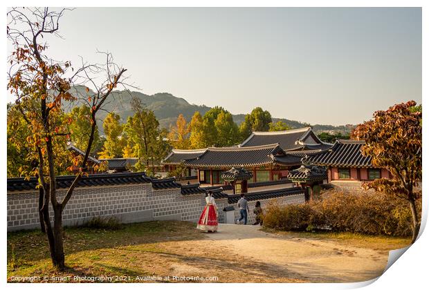 Women in hanboks walking at Gyeongbokgung Palace, Seoul, South Korea Print by SnapT Photography