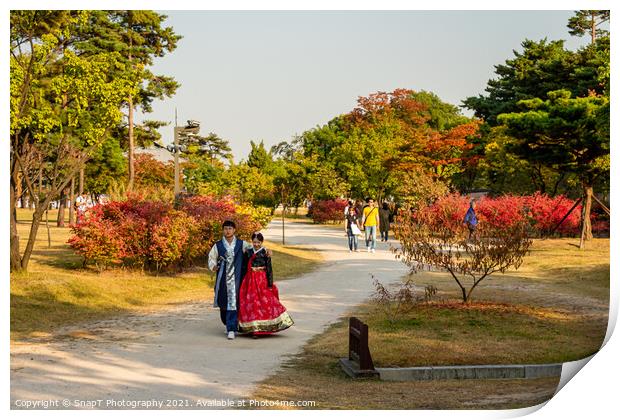 A couple in traditional Korean hanbok dress at Gyeongbokgung Palace, Seoul Print by SnapT Photography
