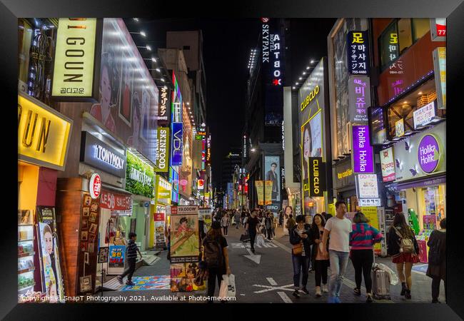 Myeongdong Shopping District at night in Seoul, South Korea Framed Print by SnapT Photography
