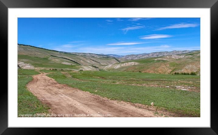 Dirt track leading up a Mongolian grassland valley on a summer day Framed Mounted Print by SnapT Photography