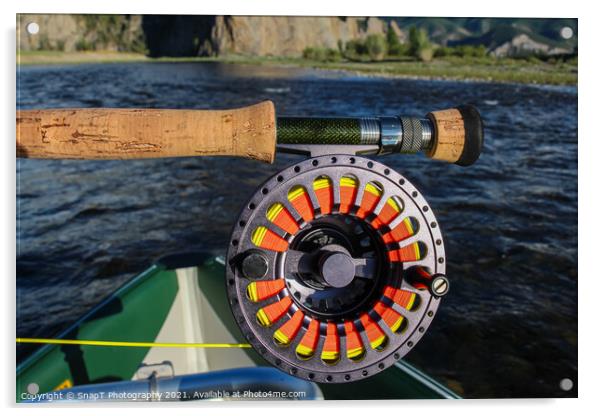 Close up of a fly fishing rod and reel in the late evening sun Acrylic by SnapT Photography