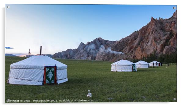 A row of Mongolian gers at a camp at sunset on a summers night, with chimney smoke Acrylic by SnapT Photography