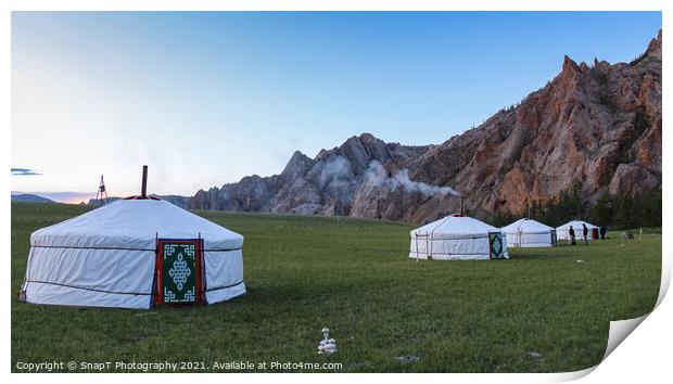 A row of Mongolian gers at a camp at sunset on a summers night, with chimney smoke Print by SnapT Photography