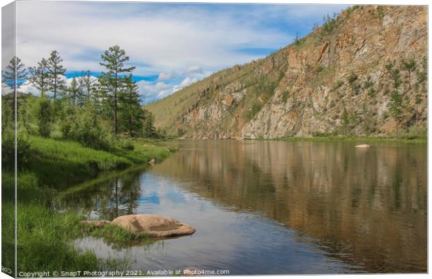 A stunning mountain reflection on a river in Mongolian on a sunny day Canvas Print by SnapT Photography