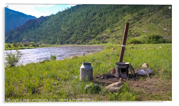 A traditional Mongolian camp cooker and chimney, beside a river Acrylic by SnapT Photography