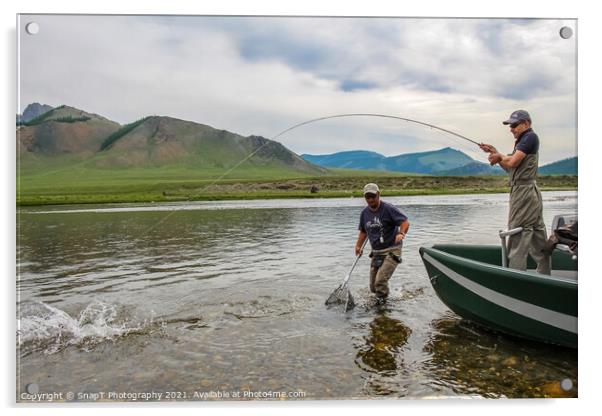 A fisherman with a Taimen Trout on the end of his line in Mongolia, Moron, Mongolia - July 14th 2014 Acrylic by SnapT Photography