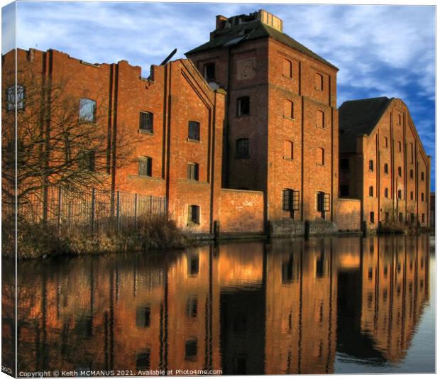 Old canal factory Canvas Print by Keith McManus