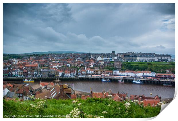 Whitby town and harbour Print by Nic Croad