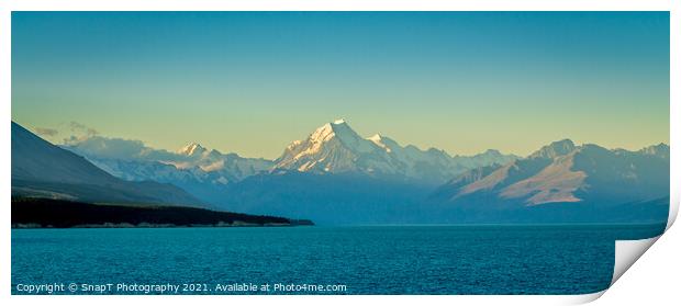 A view of Mount Cook at sunset from the shore at Lake Pukaki Print by SnapT Photography