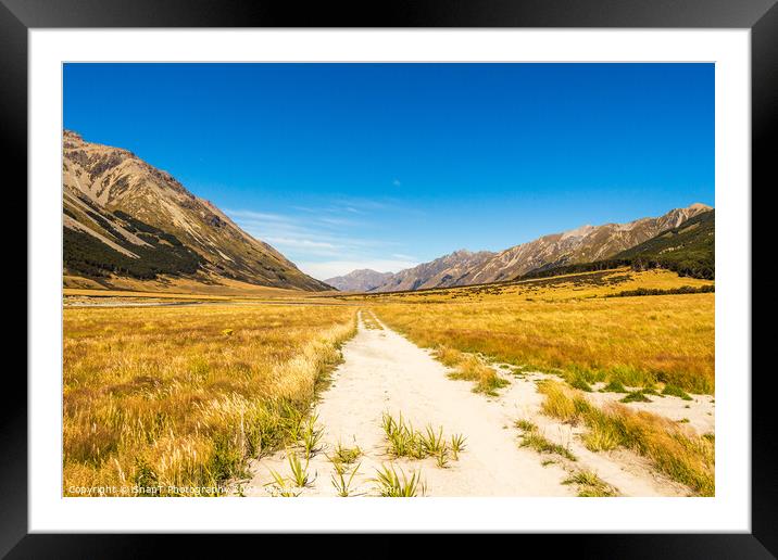The Ahuriri track, in the conservation park, leading through a grassland valley Framed Mounted Print by SnapT Photography