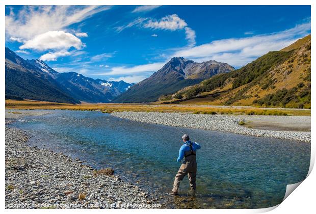 A fly fisherman casting on a beautiful mountain stream in New Zealand Print by SnapT Photography