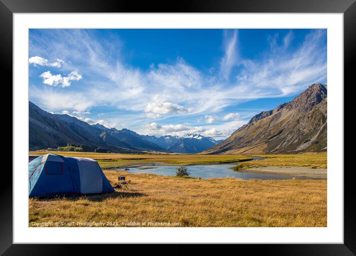 A tent pitched beside a river, surrounded by mountains, in New Zealand Framed Mounted Print by SnapT Photography