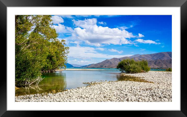 The slow flowing Pukaki river as it flows into Lake Benmore on a sunny day Framed Mounted Print by SnapT Photography