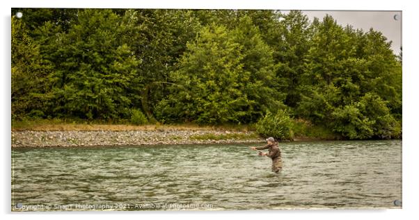 A fly fisherman spey casting while wading in a fast flowing, green, glacial river. Acrylic by SnapT Photography