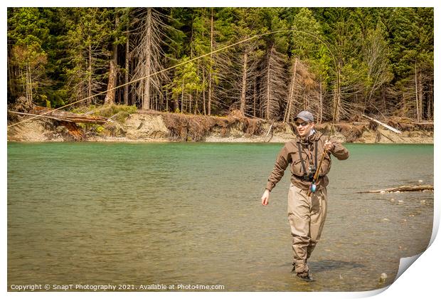 A sport fly fisherman hooked into a salmon on a river in British Columbia Print by SnapT Photography