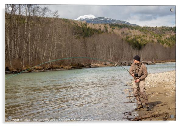 A fly fisherman hooked into a big fish in a river  Acrylic by SnapT Photography