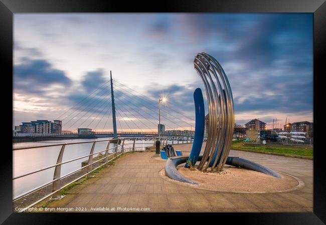 Sail bridge at Swansea marina with sculpture in foreground Framed Print by Bryn Morgan
