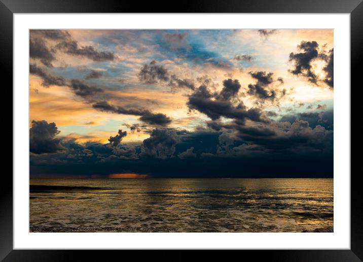 Coast of a sea and dramatic sky. Framed Mounted Print by Sergey Fedoskin