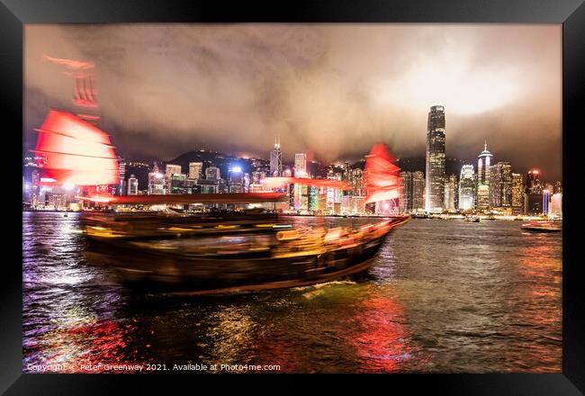 Chinese 'Junk' Boat Sailing On The Water In Victoria Harbour At  Framed Print by Peter Greenway