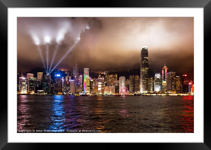 Laser Light Show Over Victoria Harbour At Tsim Sha Tsui, Hong Kong Framed Mounted Print by Peter Greenway