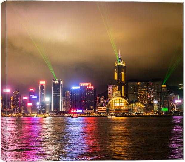 Laser Light Show Over Victoria Harbour At Tsim Sha Tsui, Hong Ko Canvas Print by Peter Greenway