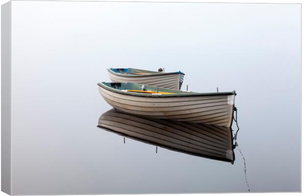 Tranquil Reflections of Boats Canvas Print by Tommy Dickson