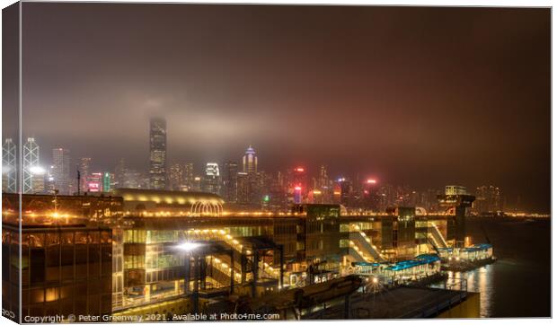 China Ferry Terminal, Hong Kong Illuminated At Night Canvas Print by Peter Greenway