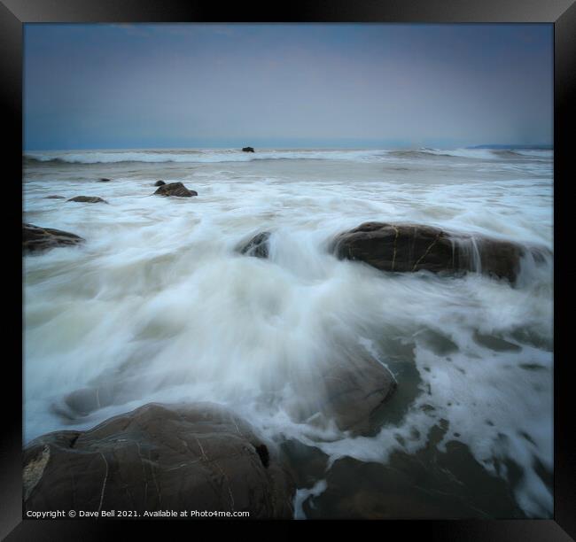 Rocky Sea Shore Foaming Water Framed Print by Dave Bell
