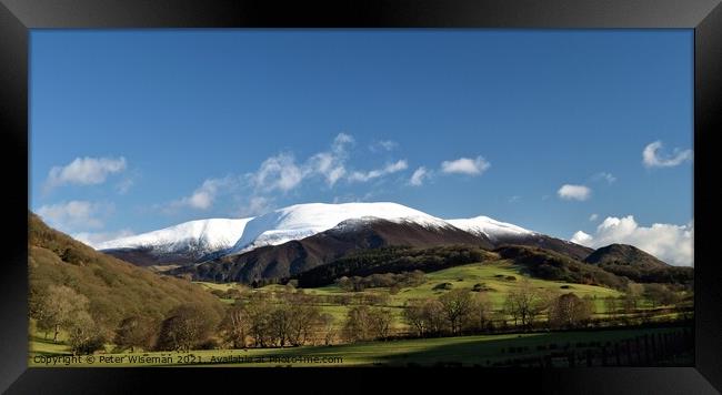 Snow capped Skiddaw viewed from Wythop Valley Framed Print by Peter Wiseman