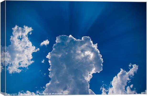 Clouds and Sunbeams Canvas Print by Nic Croad