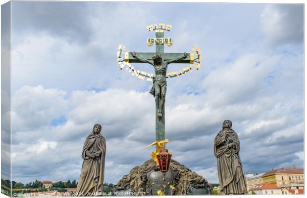 The statue Crucifix and Calvary on Charles Bridge in Prague, Czech Republic Canvas Print by Chun Ju Wu