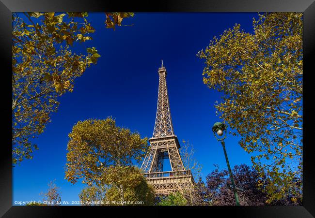Eiffel Tower with sunny blue sky in Paris, France Framed Print by Chun Ju Wu