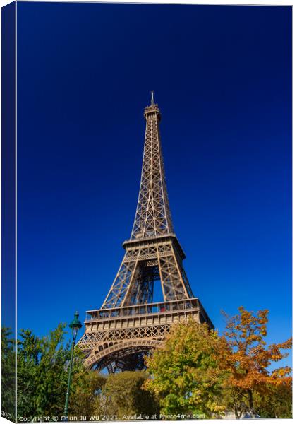 Eiffel Tower with sunny blue sky in Paris, France Canvas Print by Chun Ju Wu