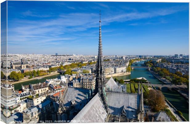 View of the center tower from the top of Notre Dame Cathedral in Paris, France Canvas Print by Chun Ju Wu