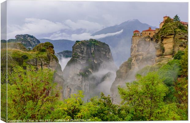 Monastery of Varlaam in the fog, the second largest Eastern Orthodox monastery in Meteora, Greece Canvas Print by Chun Ju Wu