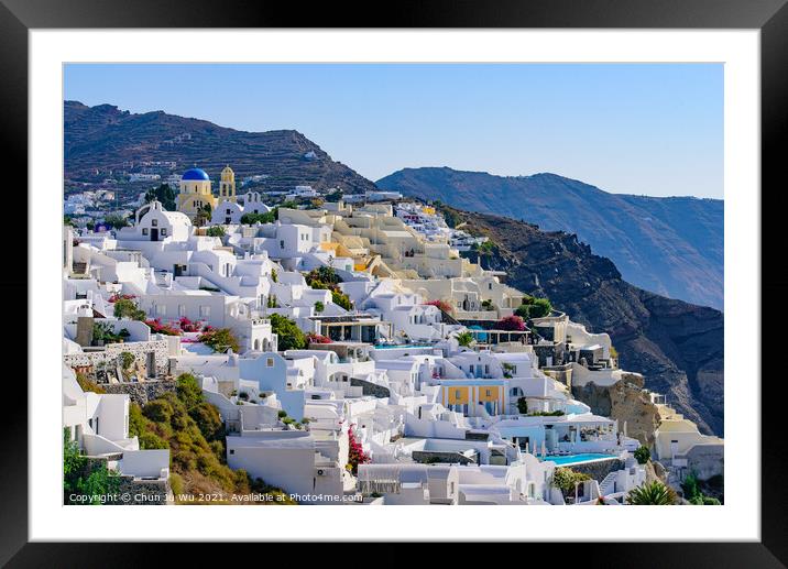 Traditional white buildings facing Aegean Sea in Oia, Santorini island, Greece Framed Mounted Print by Chun Ju Wu