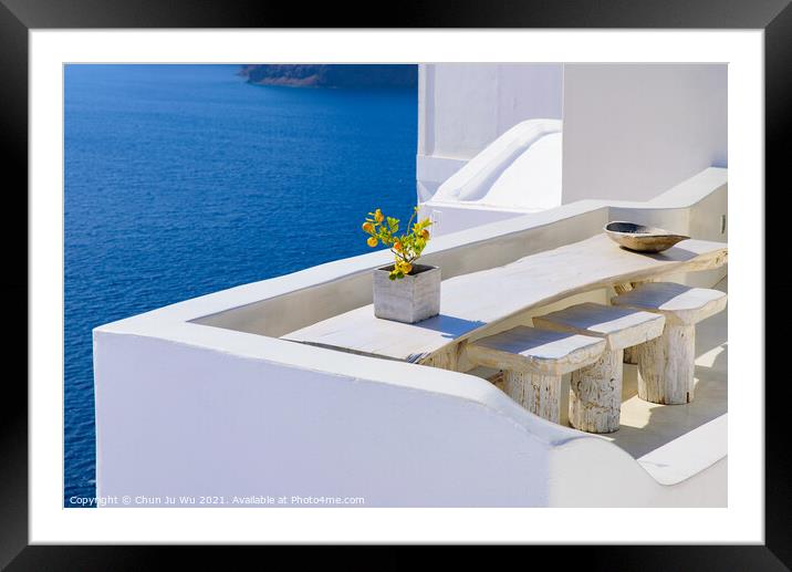 Outdoor seats facing Aegean Sea in Oia, Santorini, Greece Framed Mounted Print by Chun Ju Wu