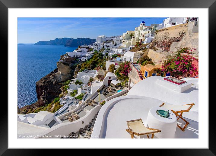 Traditional white buildings facing Aegean Sea in Oia, Santorini island, Greece Framed Mounted Print by Chun Ju Wu