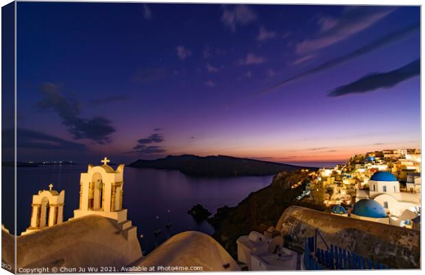Night view of blue domed churches and bell tower facing Aegean Sea in Oia, Santorini, Greece Canvas Print by Chun Ju Wu