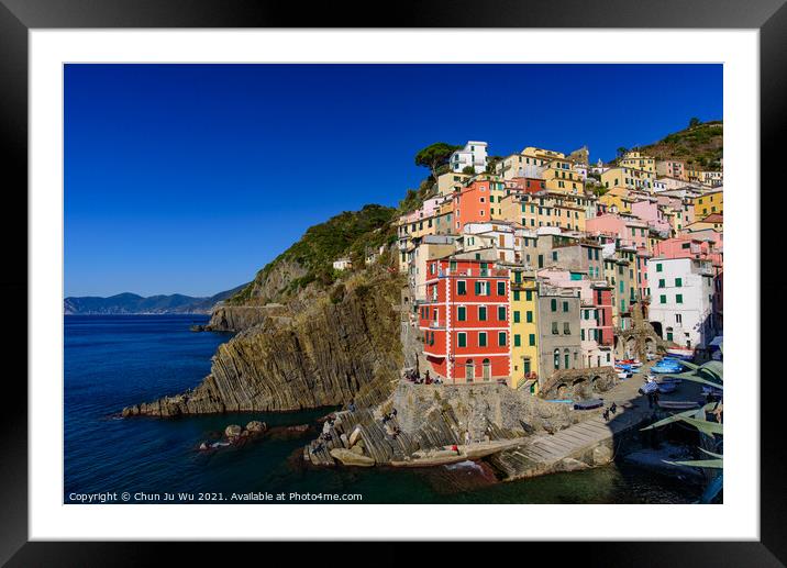 Riomaggiore, one of the five Mediterranean villages in Cinque Terre, Italy, famous for its colorful houses Framed Mounted Print by Chun Ju Wu