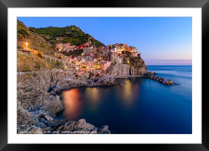 Sunset and night view of Manarola, one of the five Mediterranean villages in Cinque Terre, Italy, famous for its colorful houses and harbor Framed Mounted Print by Chun Ju Wu