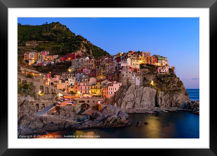 Sunset and night view of Manarola, one of the five Mediterranean villages in Cinque Terre, Italy, famous for its colorful houses and harbor Framed Mounted Print by Chun Ju Wu