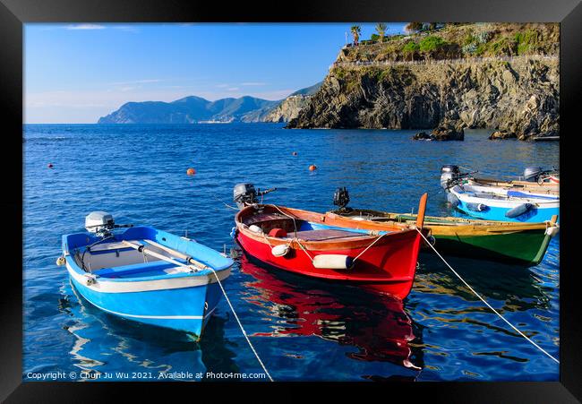 Fishing boats at Manarola, one of the five Mediterranean villages in Cinque Terre, Italy, famous for its colorful houses and harbor Framed Print by Chun Ju Wu