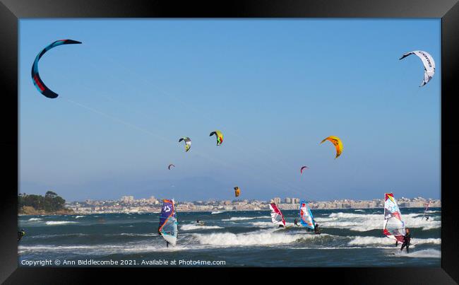  kite surfers and windsurfers  Framed Print by Ann Biddlecombe