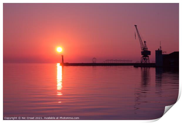 Port crane at sunset Print by Nic Croad