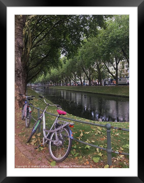 Bicycle in downtown Dusseldorf Framed Mounted Print by Graham Lathbury