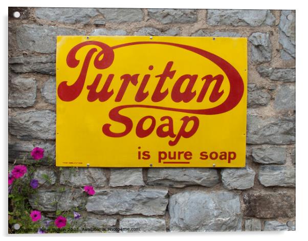 Enamel sign advertising Puritan soap on a wall in Buckfastleigh, Devon. Acrylic by Peter Bolton