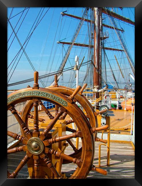 The ships wheel and view across the deck of tall ship Khersones. Southend on sea visit. Framed Print by Peter Bolton