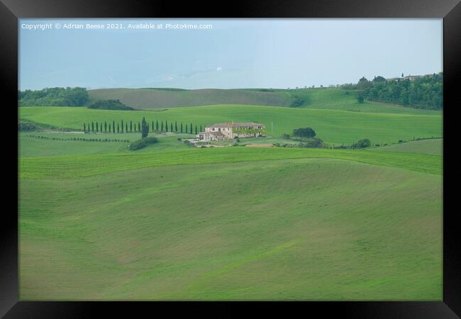 Tuscan hill farm Framed Print by Adrian Beese